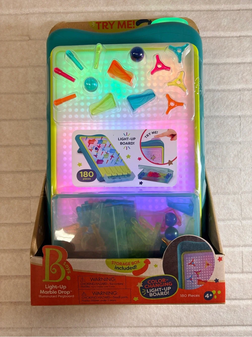 Light-Up Marble Drop Pegboard Toy - Teal Frame with Multicolor Pegs